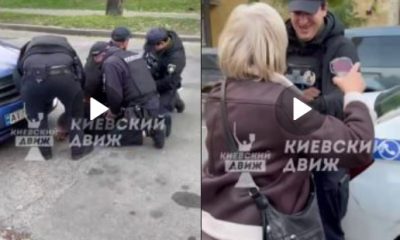 Поліцейський з посмішкою розбив жінкі голову в Києві — інцидент потрапив на відео